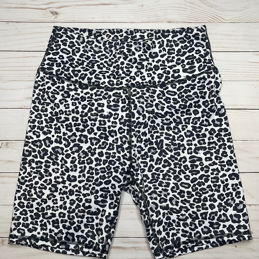 Persit high waisted activewear shorts.  Color: white Leopard. Size medium.